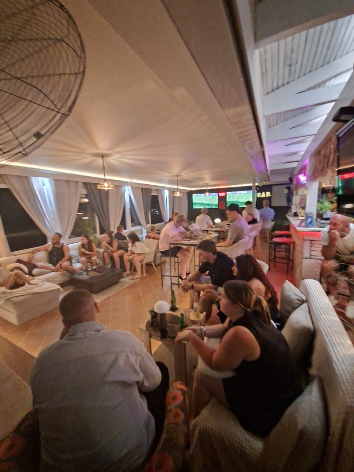 Guests enjoying an evening of football at Tebra