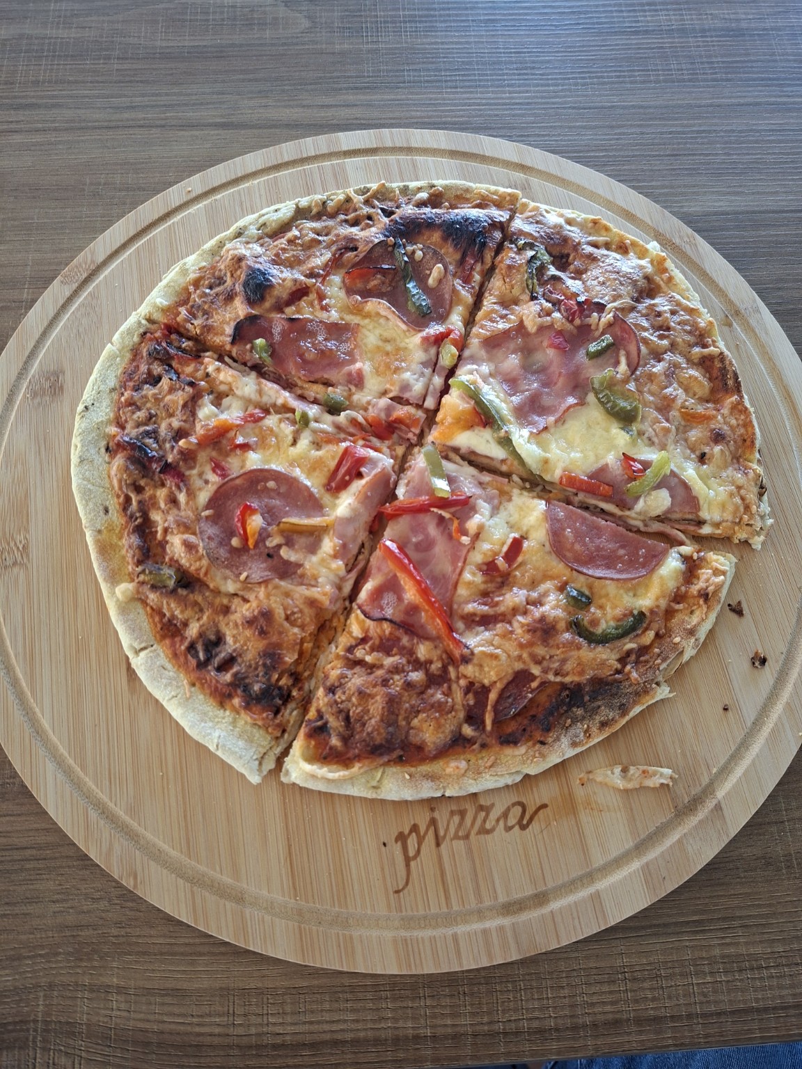 Pizza served at Tebra Premium Sports Bar